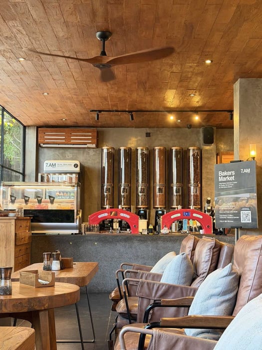 The coffee counter with pastry cabinet and self-serve drink dispensers at 7AM Bakers and 7PM Diners