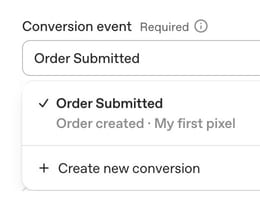 The Conversion event dropdown in an OpenAI Ads Manager campaign, with Order Submitted selected, labelled Order created and My first pixel, and a Create new conversion option.